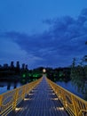 The reflection of the pontoon and pontoon in the water at night forms a beautiful pictureÃ¯Â¼Ë4Ã¯Â¼â°.